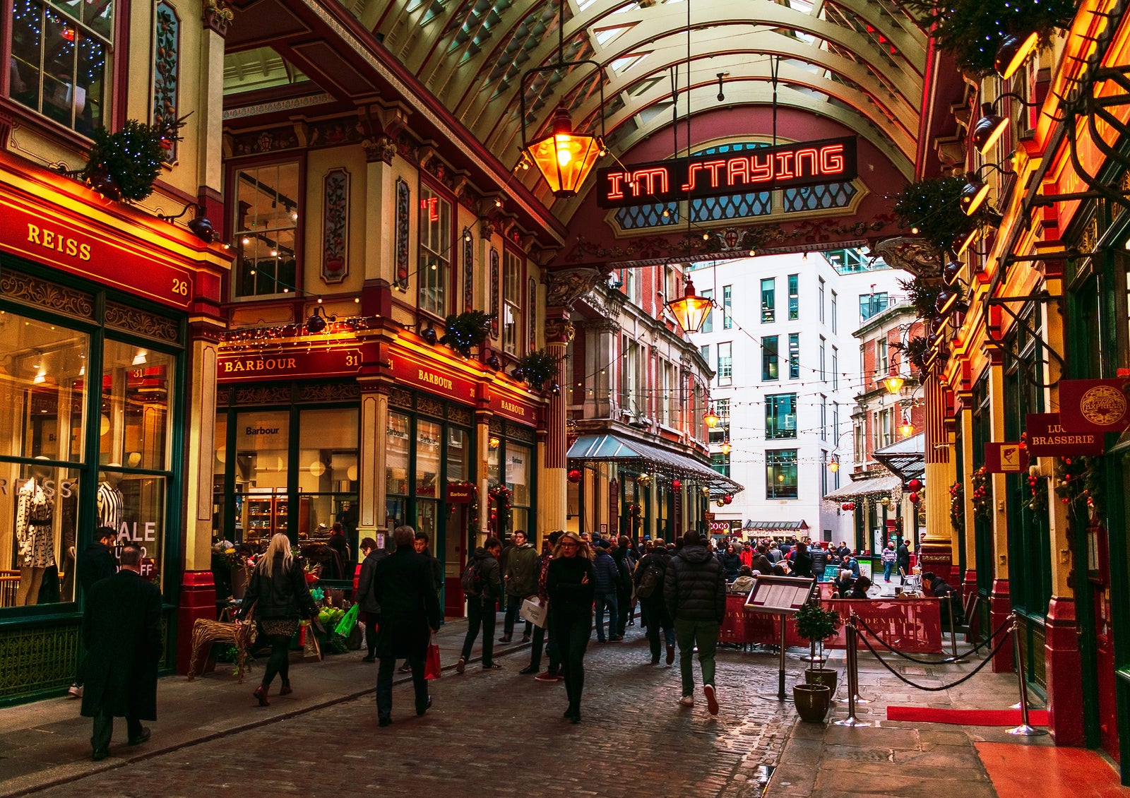 London, UK/Europe; 23/12/2019: Leadenhall Market, a covered market in the City of London financial district. People walking and shopping at Christmas.