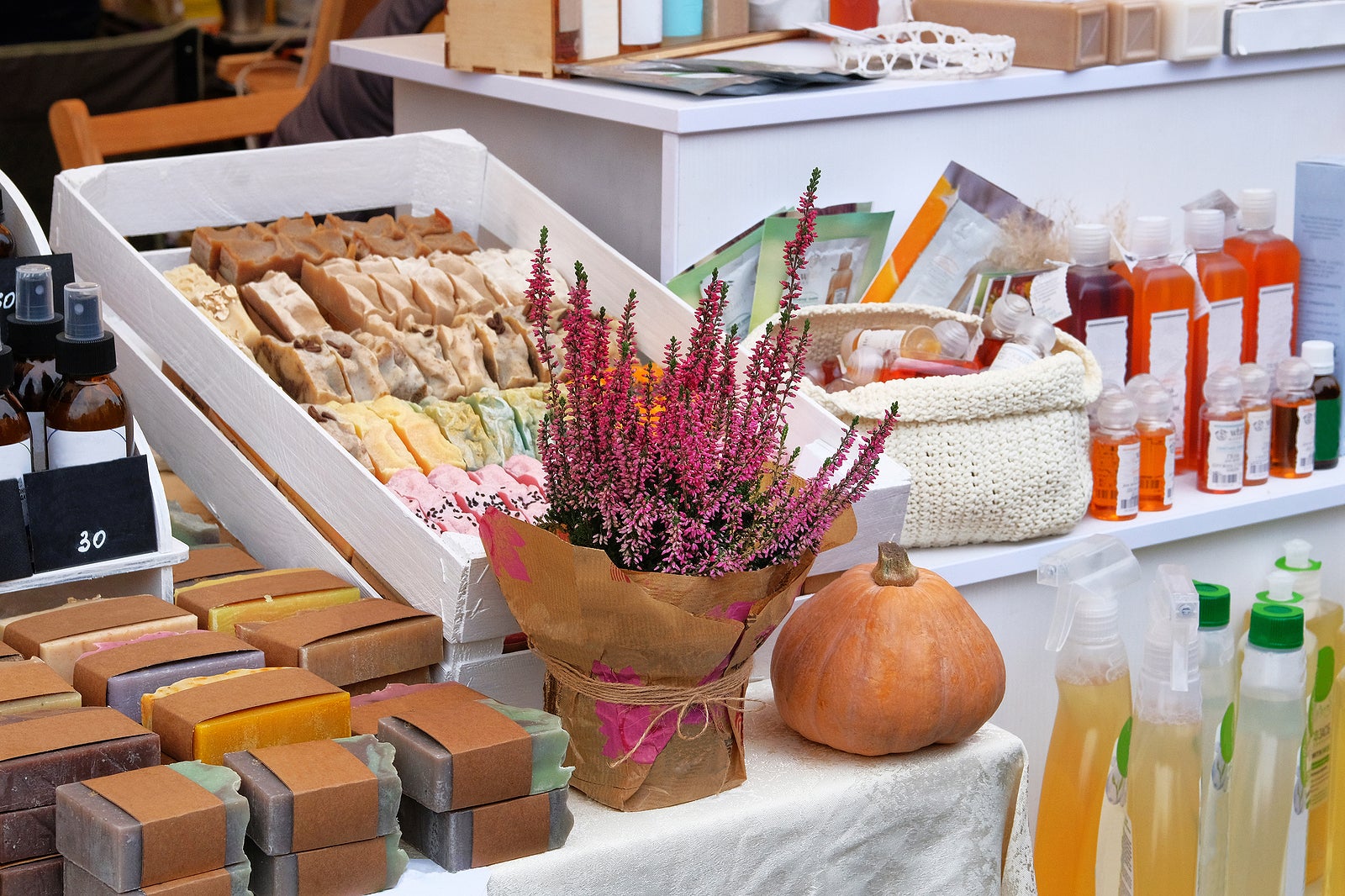 Cosmetics with organic natural ingredients sold at the fair. Handmade natural cosmetics. Variety of herbal cosmetic products.