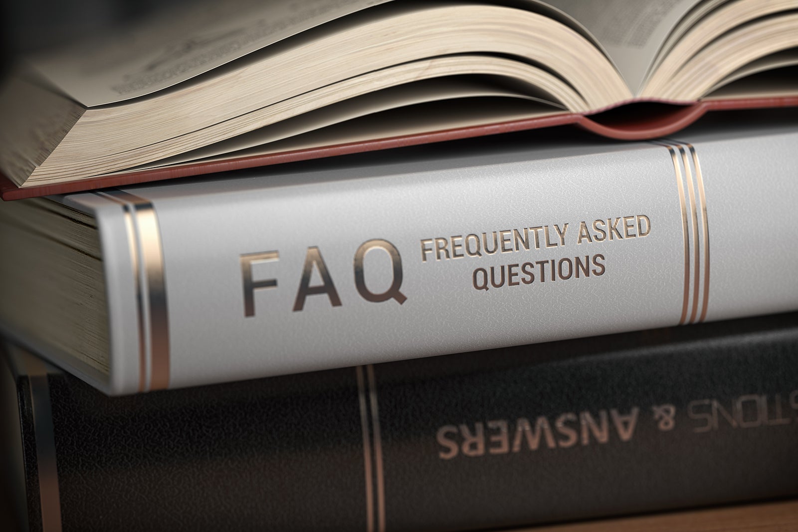 FAQ Frequently asked questions concept. Books with FAQ on the cover. 3d illustration