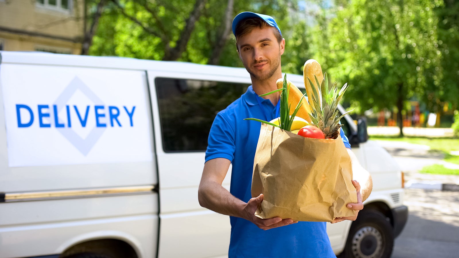 Bigstock Delivery Company Worker Holdin 348001876 