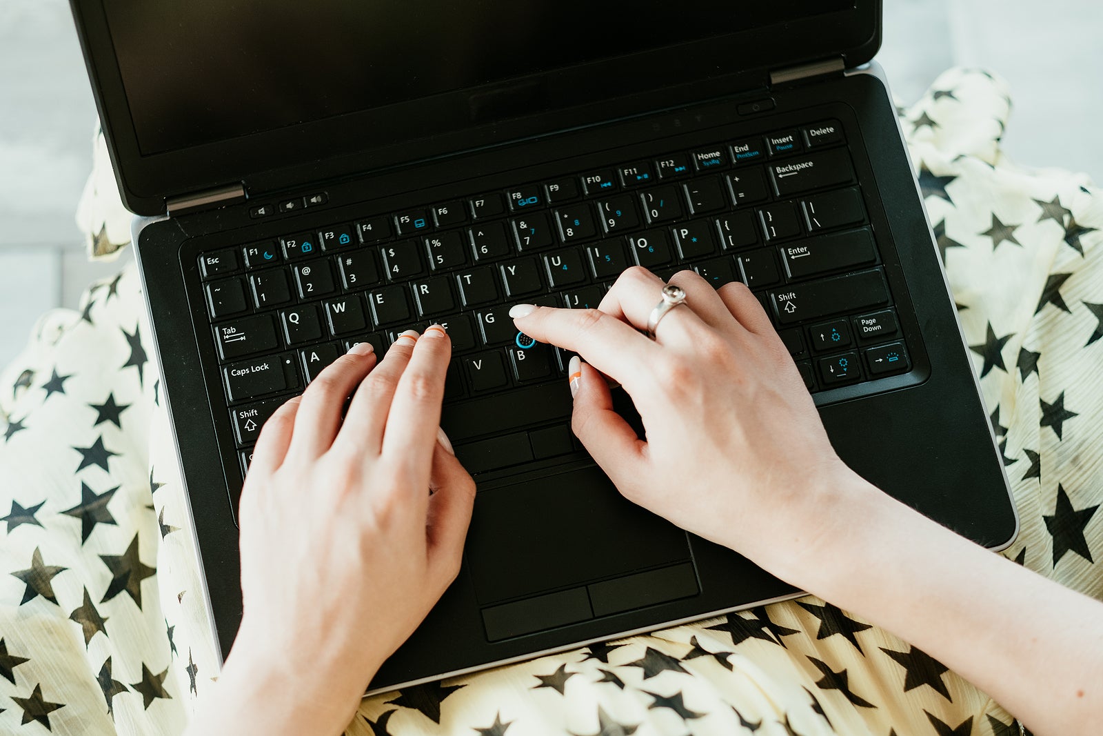 data entry freelance job. remote working and earning money online. woman hands typing on the laptop.
