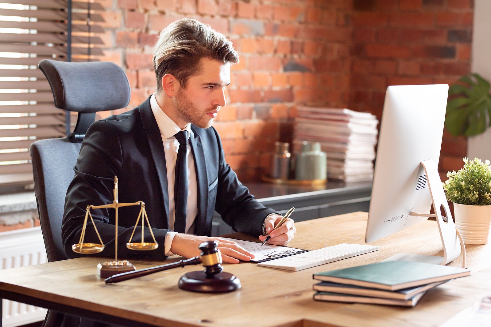 Lawyer or attorney working in office. Law and justice concept