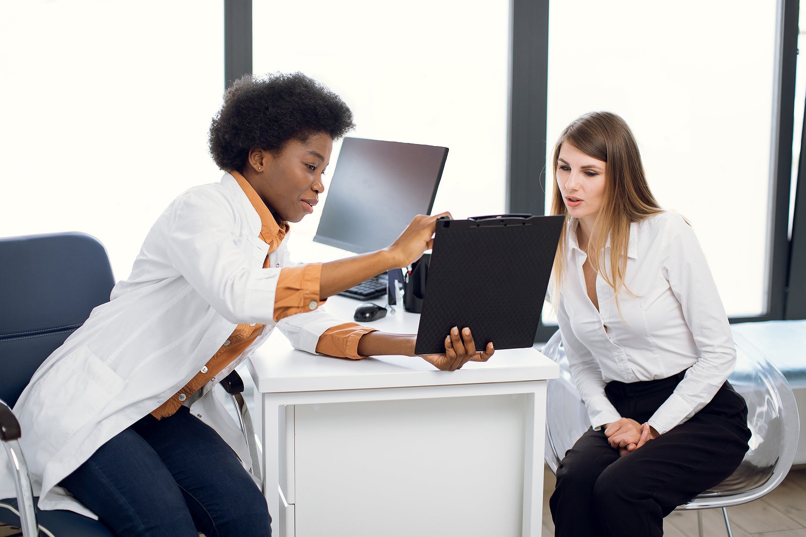 a doctor caring for her patient