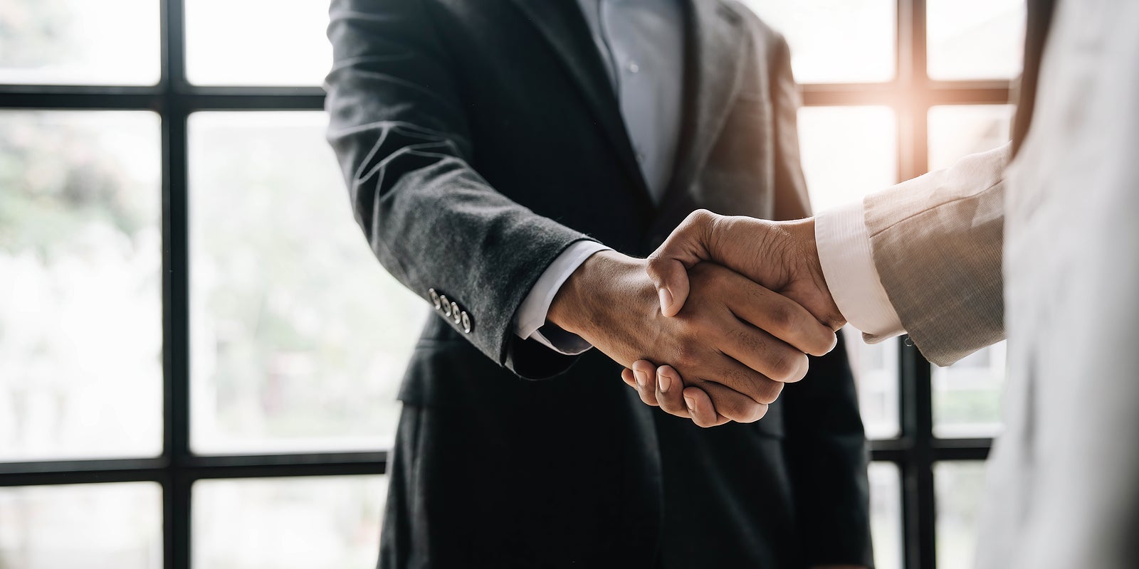 business people shaking hands