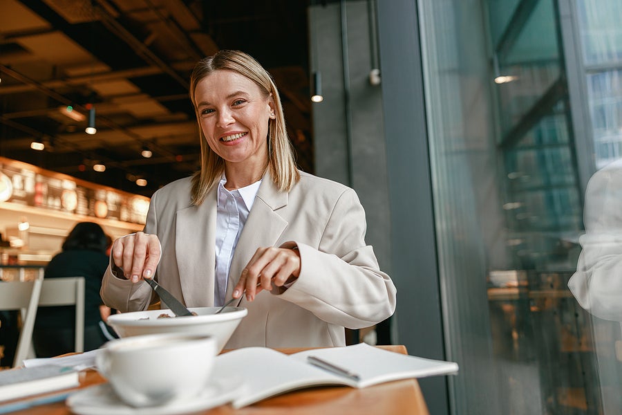 a business woman enjoying a delicious meal