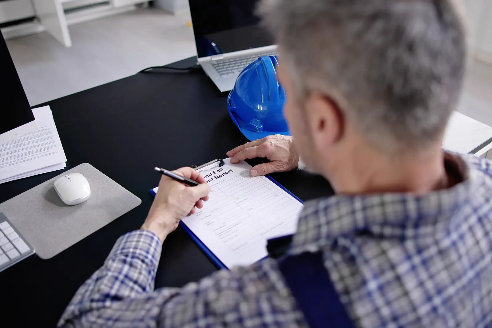 a worker filing an accident report