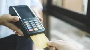 a business using handheld payment processing