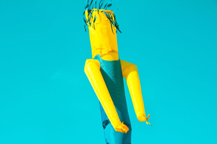a photo of an air dancer being used as a marketing tool