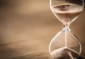 sand falling in an hourglass