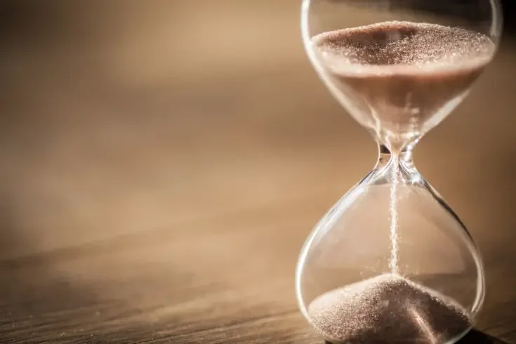 sand falling in an hourglass