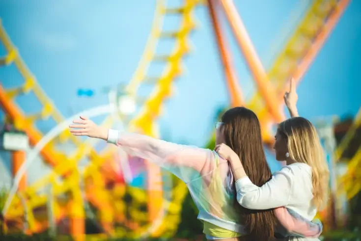 happy people at an amusement park