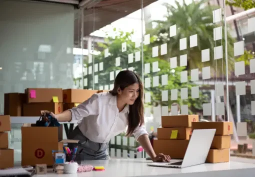 a business owner using chatGPT to automate tasks