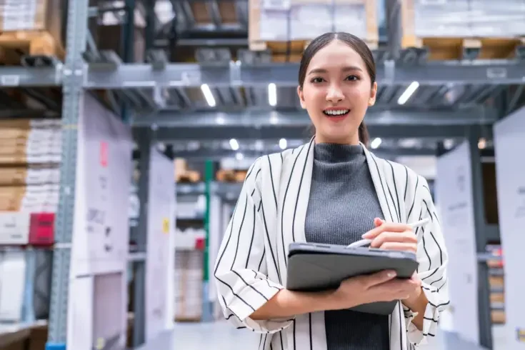 a business woman smiling at work