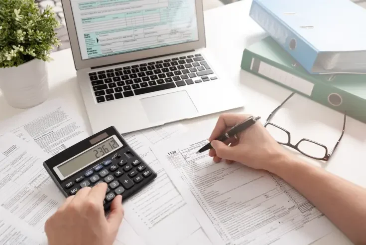 a person working on tax forms