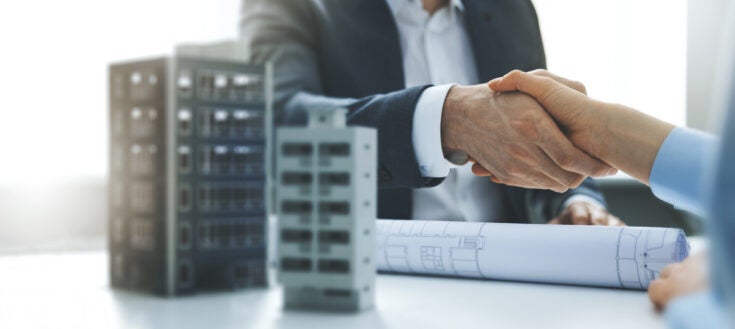 business people shaking hands