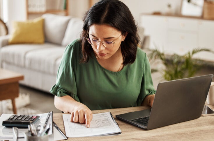 a business owner reviewing expenses