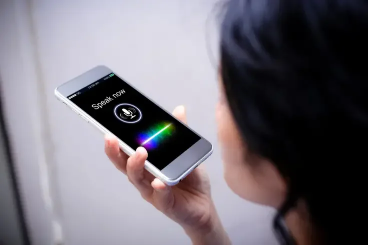 a person using voice to speech software on their phone