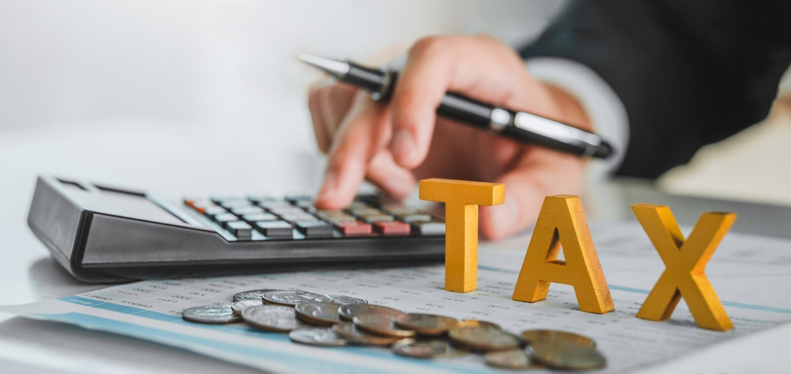 Business TAX plan development for fill in the income tax online return form for payment. Financial research,government taxes and calculation tax return concept.