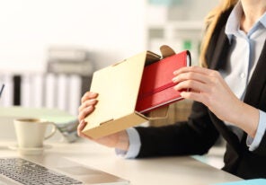 a person receiving a corporate gift