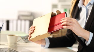 a person receiving a corporate gift