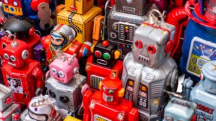 a collection of vintage robot toys