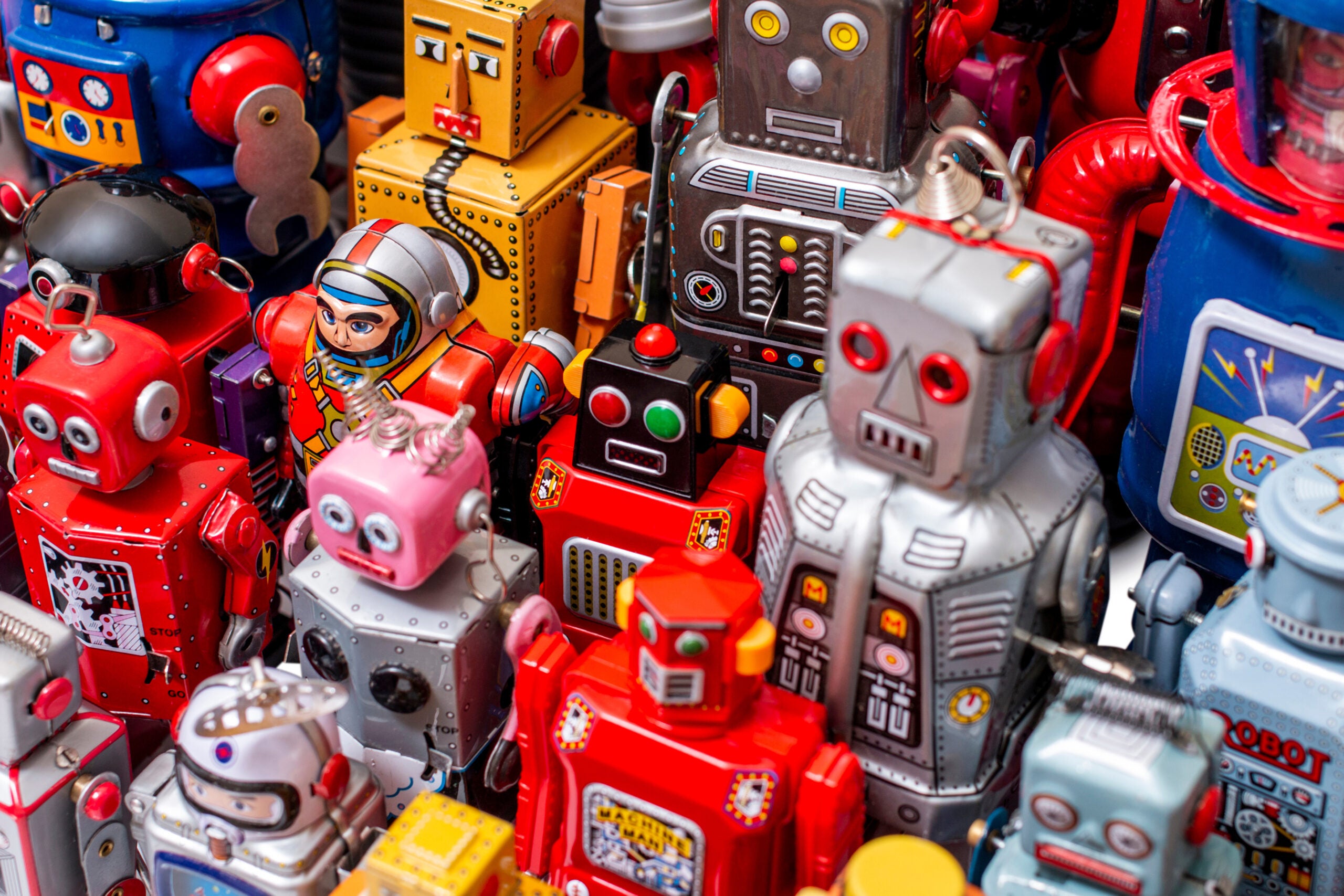 a collection of vintage robot toys