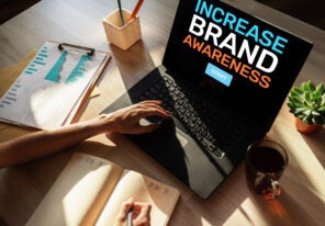a computer screen that reads "Increase Brand Awareness"