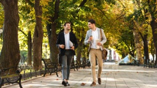 two young businessmen out for a walk