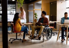 an accessible workplace full of happy diverse employees