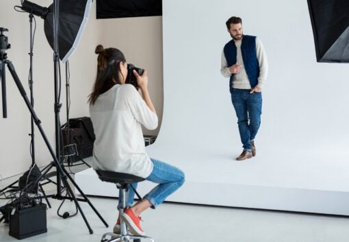 Male model posing for photographer