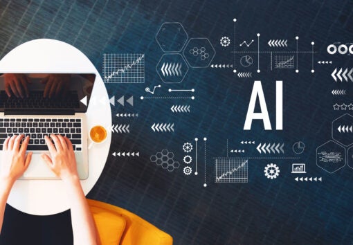 AI with person using a laptop on a white table