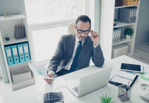 High angle top view attractive agent ceo economist employee man in trendy style chic classy formalwear look on pc gadget screen monitor hold conference blank sit on chair armchair behind table