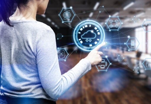 Woman work with cloud computing in office