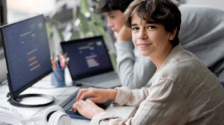 Young teens using computers