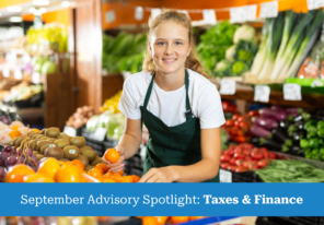 Woman arranging fruit in grocery store