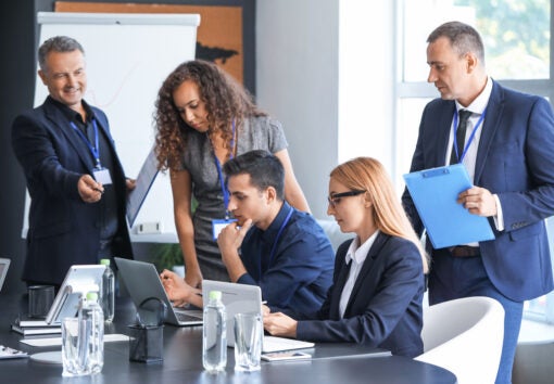 Team of business people during meeting in office