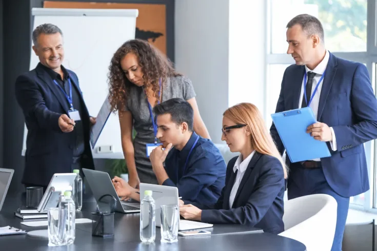 Team of business people during meeting in office