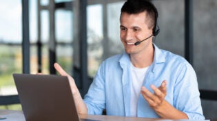 employee call center, businessman, customer support manager wearing with headset using laptop computer for virtual meeting consulting client at on video call