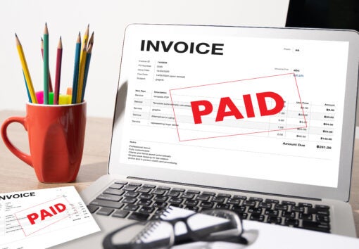 Accountant Checking Invoice