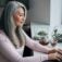 woman working on notebook at home