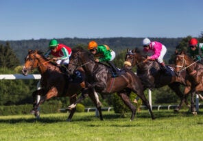 Jockeys on their horses.