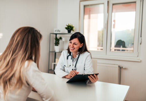 female specialist talking to her patient.