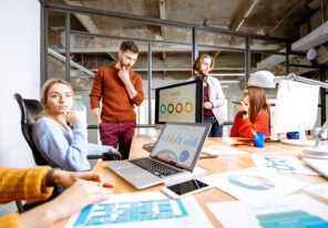 People working together on the computers in the office