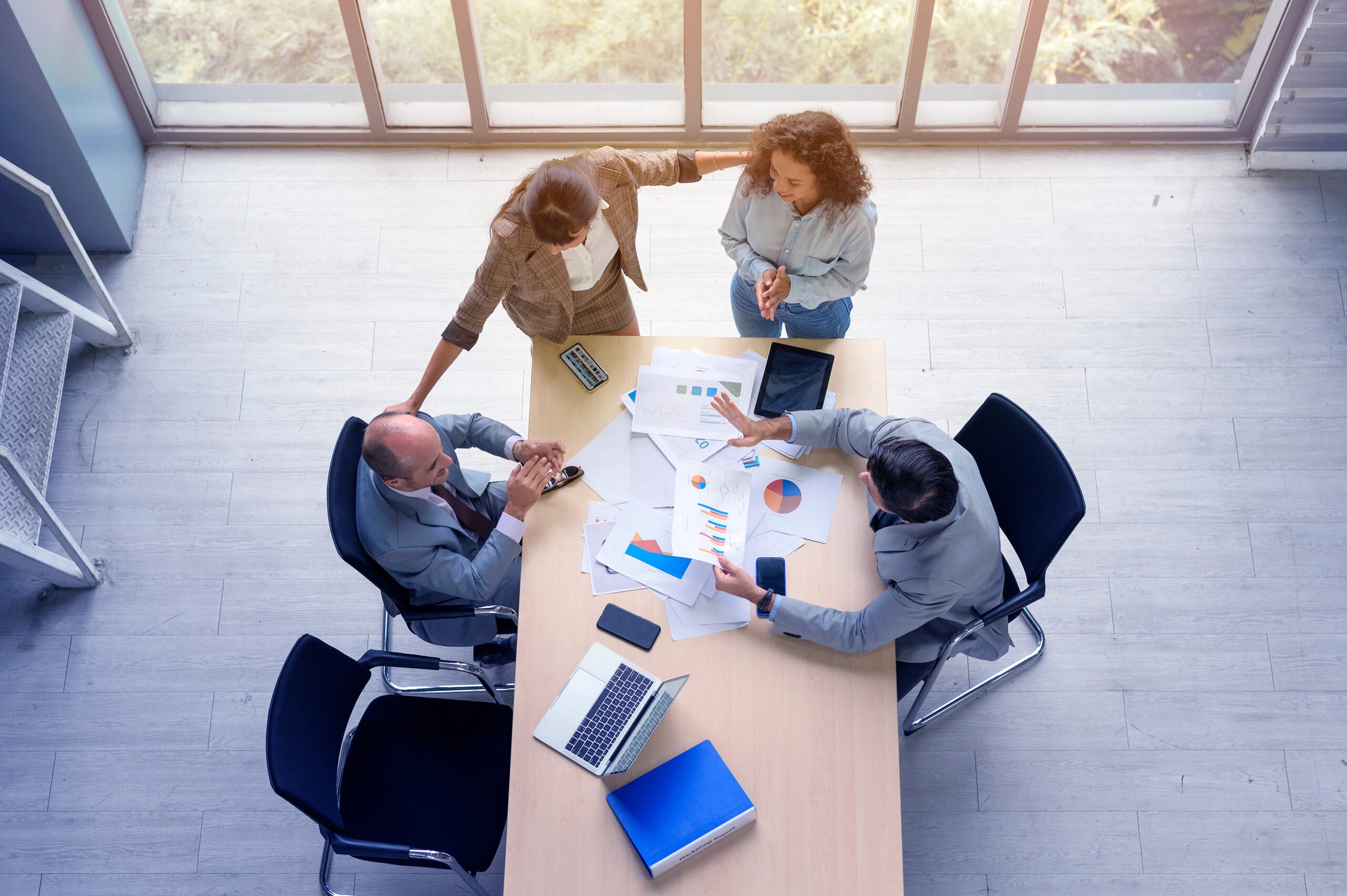 Top view of business people are meeting in office , business teamwork concept .