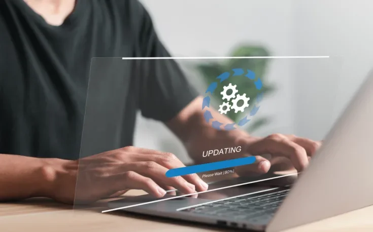 Businessman working and Installing update process. Software update or operating system upgrade to keep the device up to date with added functionality in new version and improve security.