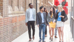 Group of young professional walking in the city