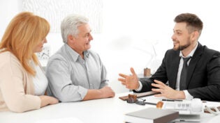 Senior couple at notary public office