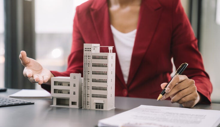 Broker signs a sales agreement. agent, lease agreement, successful deal