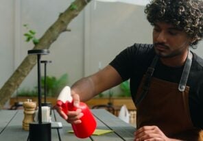 man-cleaning-table