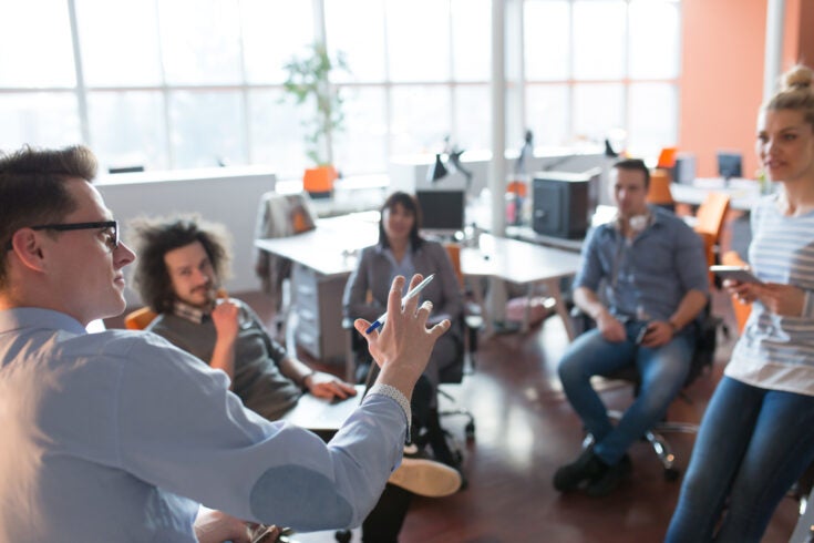 Young Business Team At A Meeting at modern office building